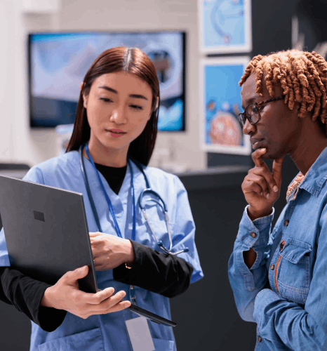 Nurse reviews multilingual consent forms using healthcare translation services to support diverse audiences in one clinic.