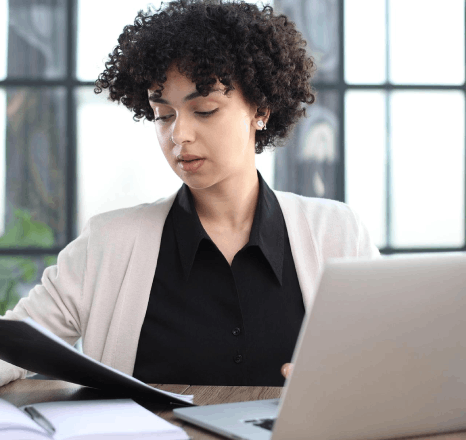 An editor updates a term glossary for secure machine translation services, keeping repeated report terms consistent.