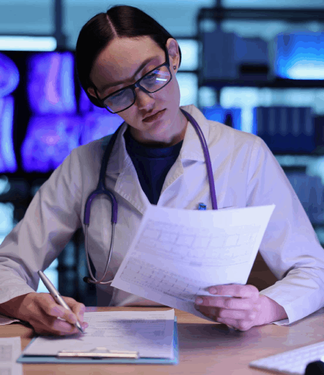 A coordinator checks translated discharge notes in an EHR, relying on life sciences translation services for healthcare use.