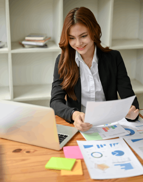 Typesetter reading a magazine for typesetting
