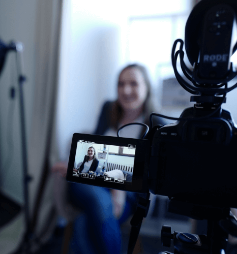A voice artist being interviewed before being hired for telephone voiceovers. A voice artist recording a commercial voiceover in a sound studio.
