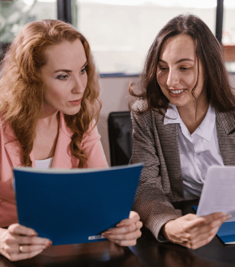 A translator shows ATA credentials while Human Resources Translation Services review governance terms for enterprise HR.