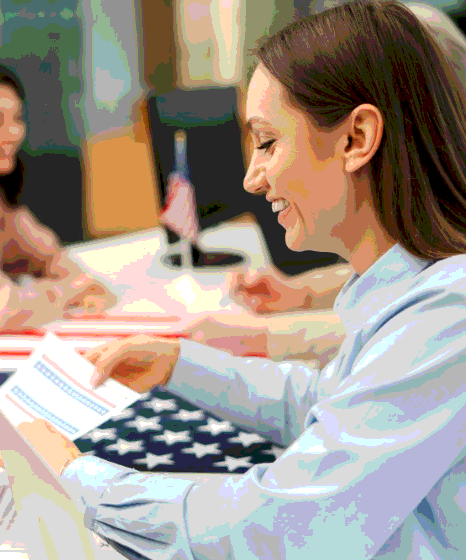 A client scans Amharic records for immigration filing while Amharic Translation Services prepare certified pages.