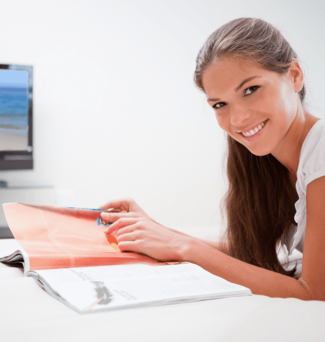 A translator formats an immigration filing packet, using Passport Translation services in New York for passport stamps.