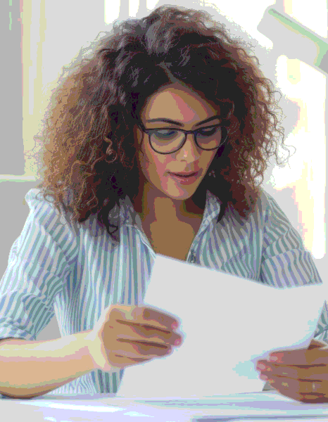A reviewer checks patient handouts and consent forms, using Amharic Translation Services for industry healthcare materials.