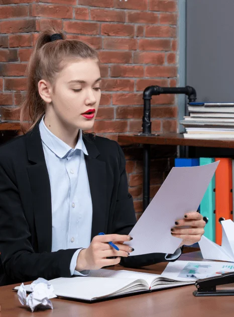 A project manager routes medical, legal, and banking files for overnight translation services to meet industry deadlines.