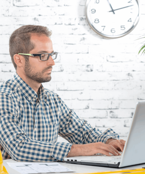 An engineer reviews a translated manual for industry-specific technical terms with Slovak translation services support.