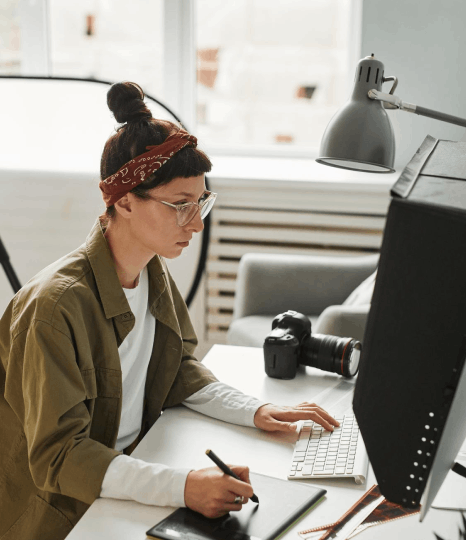 An editor cross-checks industry-specific acronyms in transcripts returned from market research transcription services.