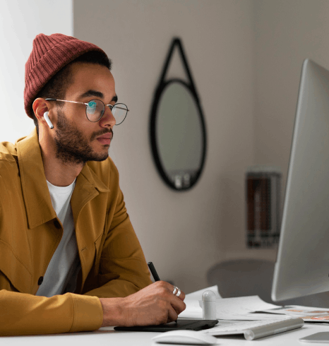 A UX researcher listens to an interview recording and flags quotes using market research transcription services for studies.