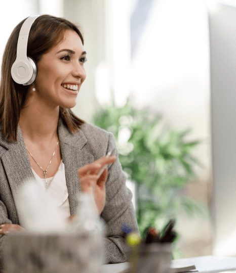 A project manager reviews an itemized quote as Netflix captioning services list per-episode minutes, languages, and add-ons.