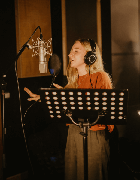 An industry expert voice actor recording an IVR voice over for a client. An industry expert voice actor recording an IVR voice over for a client.