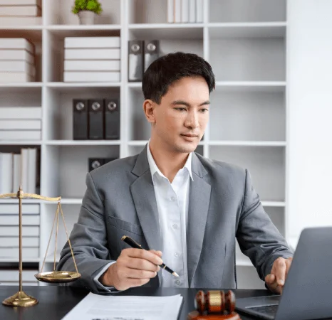 A translator compares a judgment page to the source text, using fast translation services to prevent legal errors.