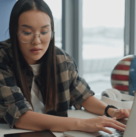 A project lead reviews an industry glossary as Tagalog Translation Services keep terminology consistent across files.