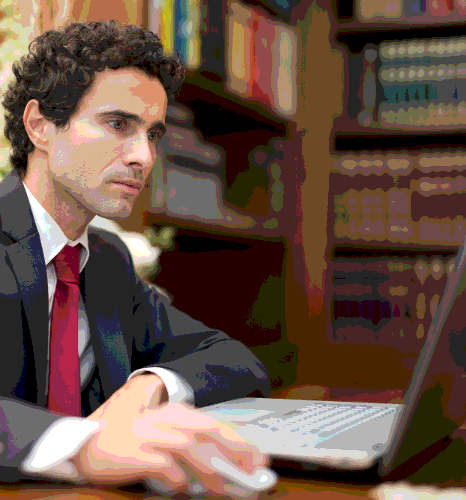 A paralegal checks names and dates in a case file while Somali Transcription Services finalize a legal transcript.