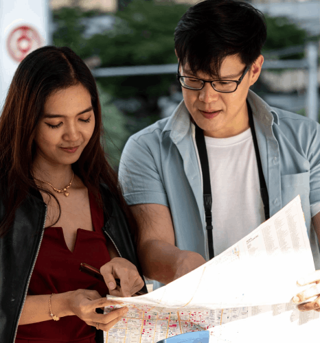 A legal team reviews a bilingual contract, relying on Thai translation services to keep terminology consistent and clear.