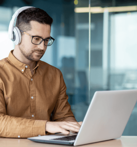 Producer reviews an accessibility compliance letter for Film Captioning Services, confirming FCC, ADA, and WCAG conformance.