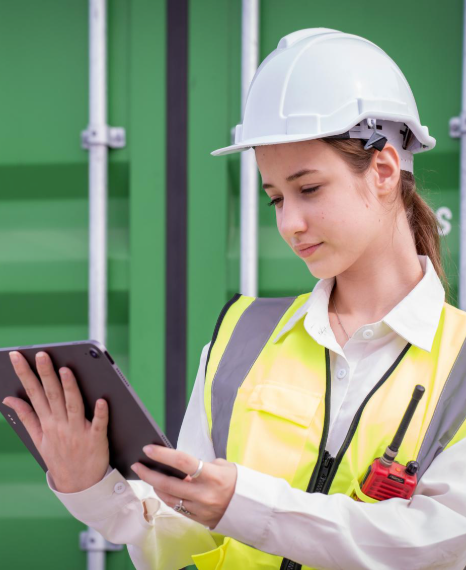 An engineer reviews a Dari user manual with diagrams as Dari Translation Services ensure technical steps stay clear.