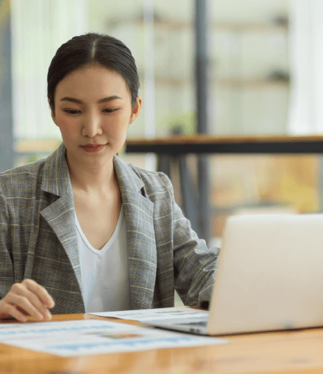 An author reviews a marked-up manuscript while Book Translation Services preserve tone and meaning for global readers.