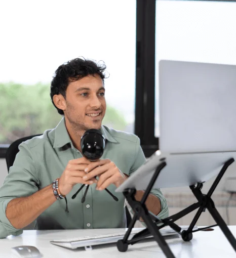 A media man using media content translations to enhance viewer engagement and entertainment in Times Square.