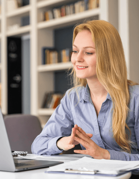 A linguist translates a medical guide spread while Book Translation Services keep industry terms precise and readable.