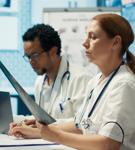 A linguist runs a trusted quality pass in medical records translation in New York, matching terms to a glossary.