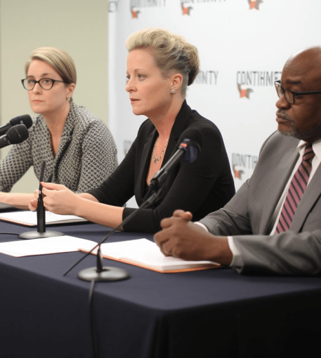 A transcriber labels multiple speakers from recorded proceedings as depositions transcription services maintain courtroom.