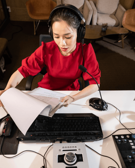 A project manager queues scans, audio, and video clips as Macedonian translation services deliver multi-format files.