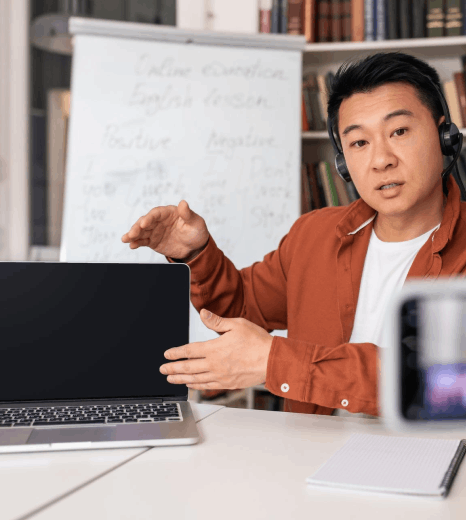 A producer syncs subtitles and on-screen text, using Thai translation services for a multi-format video deliverable.