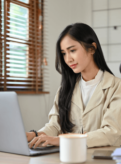 A marketer reviews localized product pages and charts as Catalog Translation Services drive multilingual business growth.