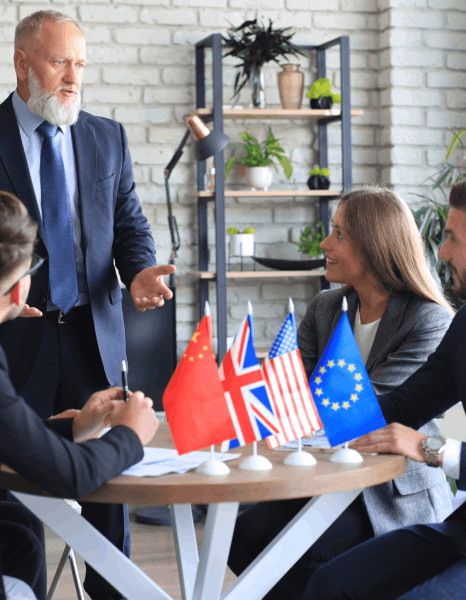 A QA reviewer compares Spanish, Chinese, and Arabic terms as insurance translation services keep multilingual wording.