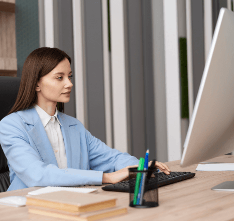 A typist switches between Spanish, French, and German drafts as Manuscript Typing Services support multilingual pages.