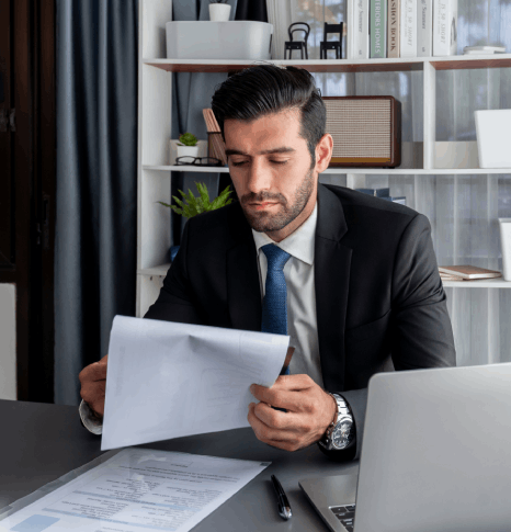A business man checks a multilingual PDF for a corporate report while one hour translation preserve layout and fonts.