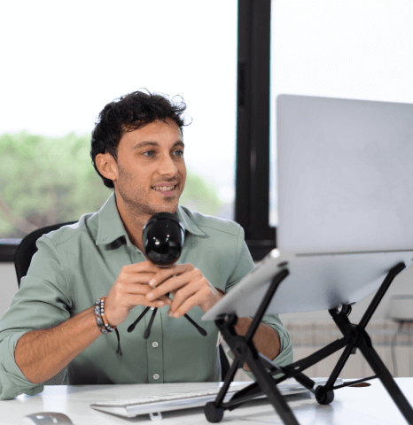 Media man using Dutch Translation Services for videos and broadcast content with cultural accuracy and quality.