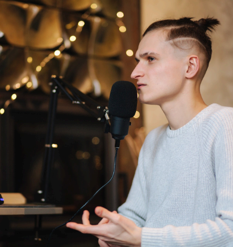 Close-up of a native Russian voice actor at a microphone, highlighting Russian Voice Over Services and fast delivery.