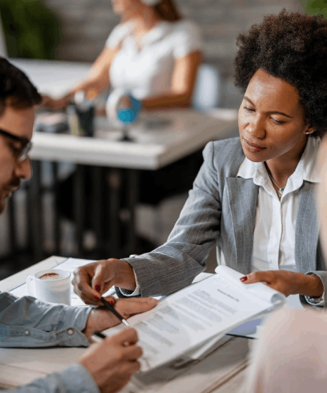 A client signs an NDA while sharing immigration records, and Hungarian translation services prepare an official file set.