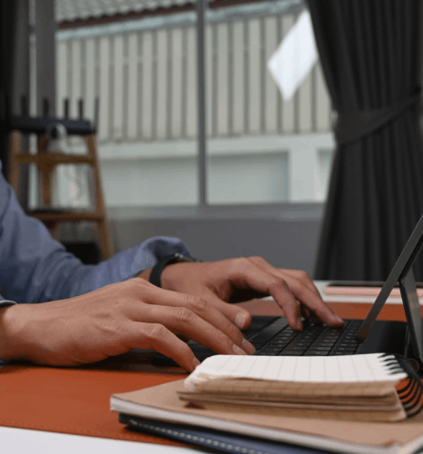 A web editor checks multilingual landing pages, using translation services for non-profit outreach and clear program details.