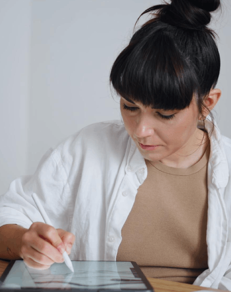 A specialist cleans up scanned pages with OCR so rush pdf translation services can translate the text quickly.