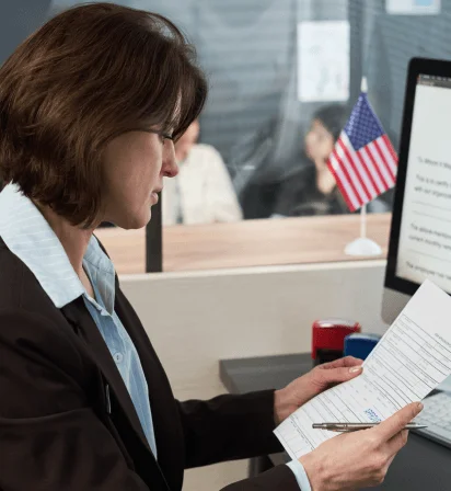 A translator applies a secure digital seal to official certified files while urgent translation services ready court.