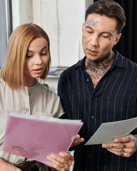 A translator reviews an official institution form and IDs using Notarized Translation services in New York for immigration.