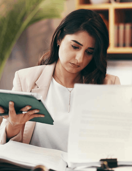 An applicant reviews a formatted certificate PDF as Gujarati Translation Services deliver an online translation.