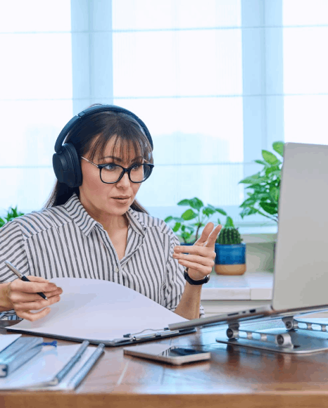A professor reviews a speaker-labeled transcript, using lecture transcription services to archive class discussions online.