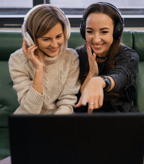 A user understanding differences through open captioning services that display text permanently on video.