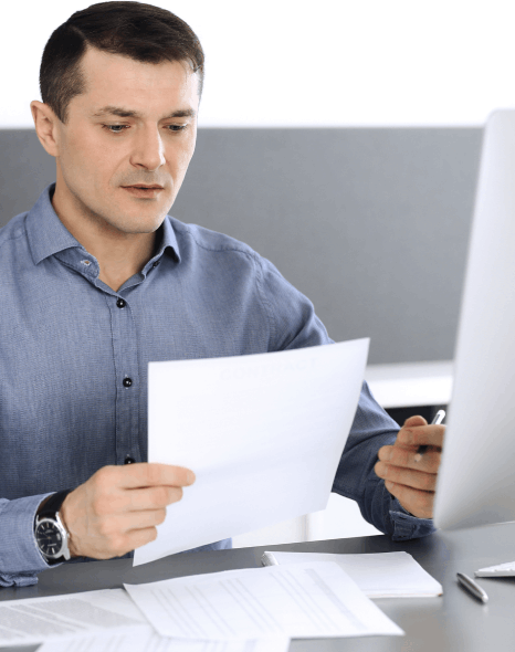 A linguist runs a per-word quality check as corporate document translation services finalize a multilingual report.