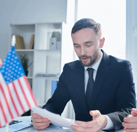 A professional translator reviews a vendor contract for business Romanian translation services.