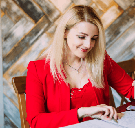 A translator compares a personal letter and a business memo, delivering Latvian translation services with matched tone.