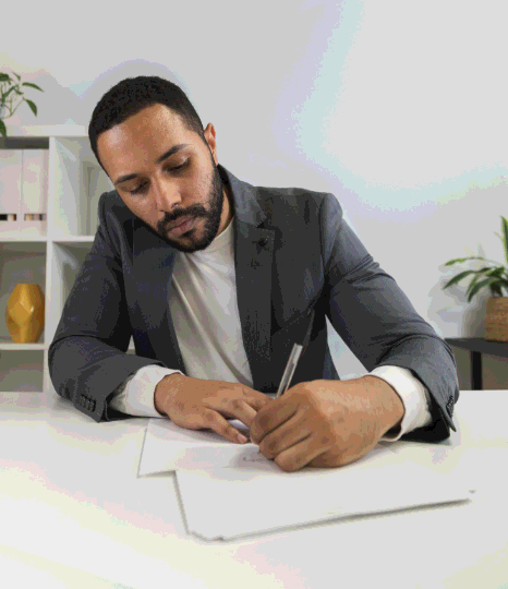 A manager checks personal and corporate records while Somali Translation Services format names, dates, and layouts.