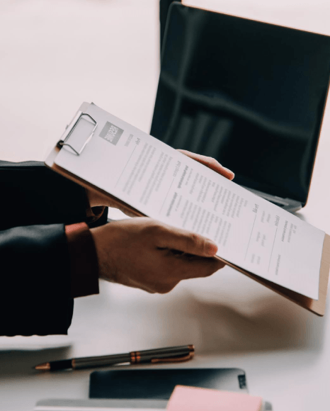 A client photographs a certificate as Urdu Translation Services process online personal documents with same-day certified.