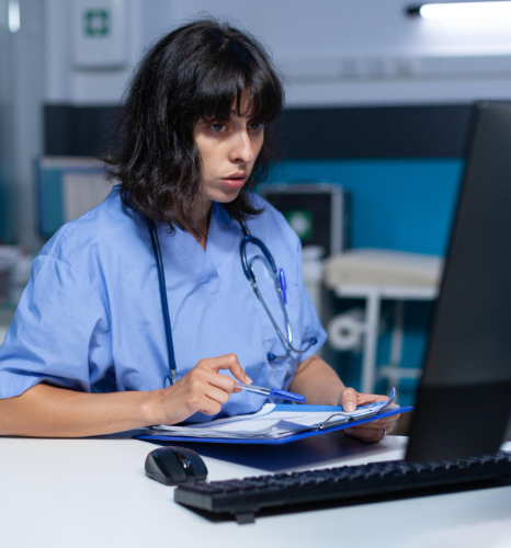 A medical writer reviews a pharma trial report draft with clinical trials translation services in New York for accuracy.