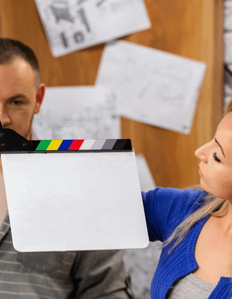 A team tests platform file formats on preview screens as italian subtitling services ensure subtitles display correctly.