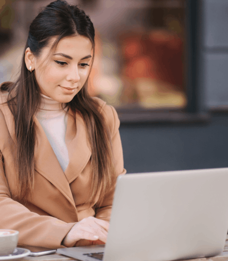 A specialist checks a policy and claim file side by side as insurance translation services prevent wording errors.